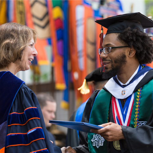 Ty Abdul Karim crossing the stage at Commencement.